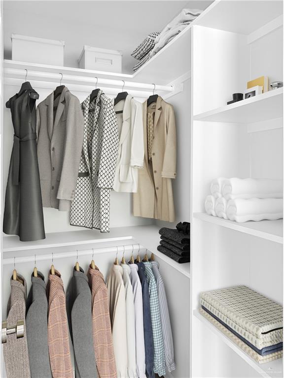 4905 Tyler, Unit 2 McAllen, TX 78503 - Photo 9 of 26 a view of walk in closet with clothes and shoes