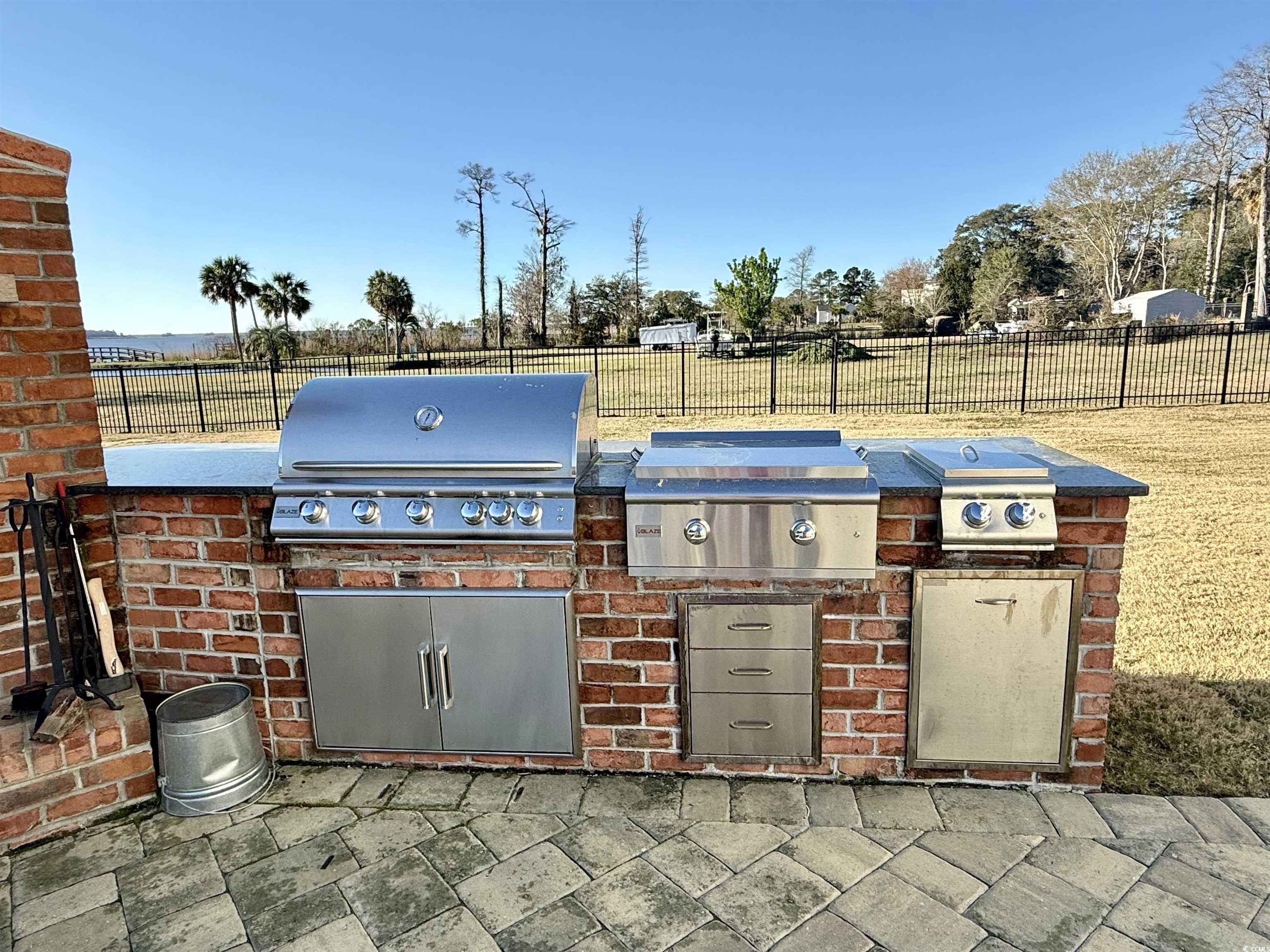 2425 South Bay Street Georgetown, SC 29440 - Photo 39 of 40 View of patio / terrace with exterior kitchen, area for grilling, and fence private yard