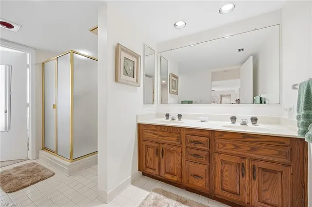 a living room with furniture a rug and a large window