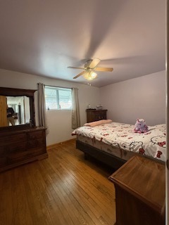 2900 East 101st Street Chicago, IL 60617 - Photo 15 of 27 a bedroom with a bed and window
