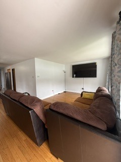 2900 East 101st Street Chicago, IL 60617 - Photo 5 of 27 a bedroom with a bed and a flat screen tv