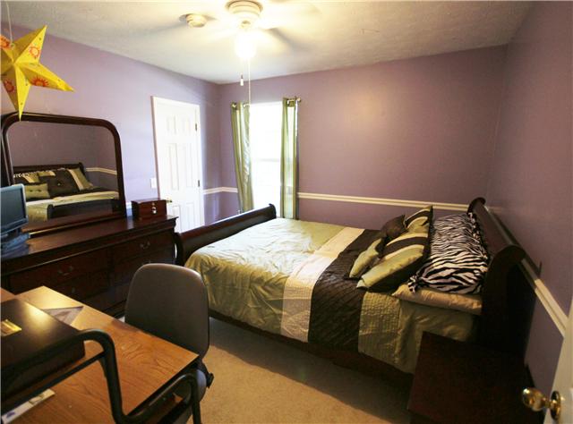 202 Nottingham Road Dickson, TN 37055 - Photo 18 of 20 Bedroom #2 has a ceiling fan and a huge walk-in closet.