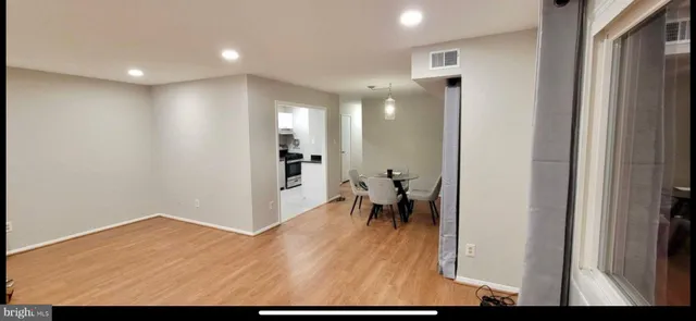 a view of dining room with wooden floor