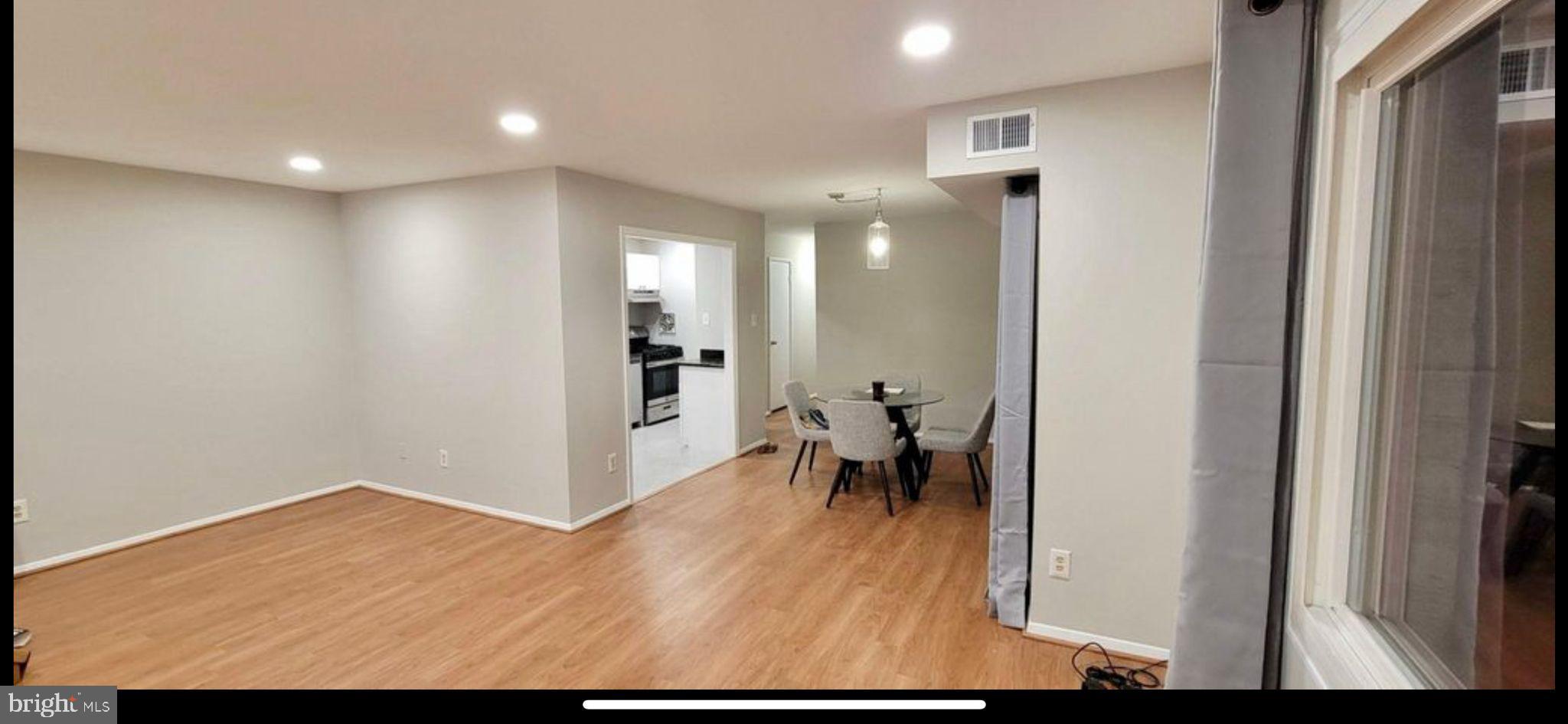2908 Kings Chapel Road, Unit 3/10 Falls Church, VA 22042 - Photo 3 of 7 a view of dining room with wooden floor