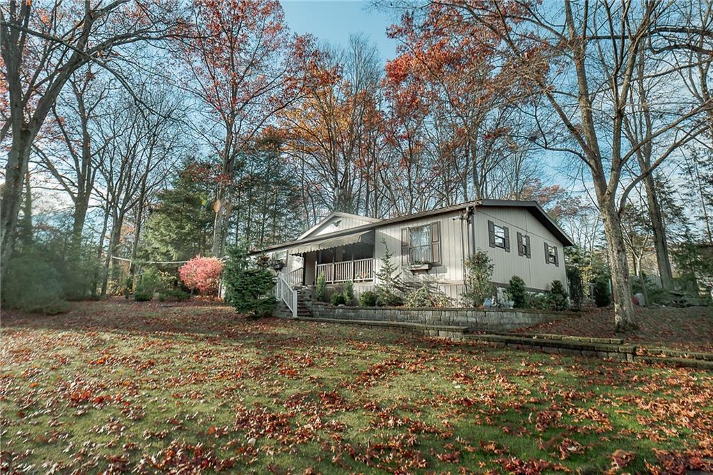3239 Chestnut Ridge Road Penn Run, PA 15765 - Photo 25 of 29 a front view of a house with a yard