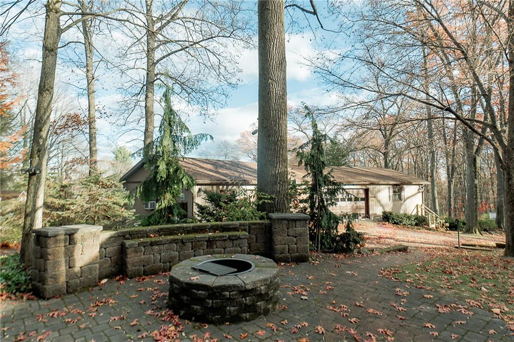 3239 Chestnut Ridge Road Penn Run, PA 15765 - Photo 27 of 29 a view of a patio with chair and tables