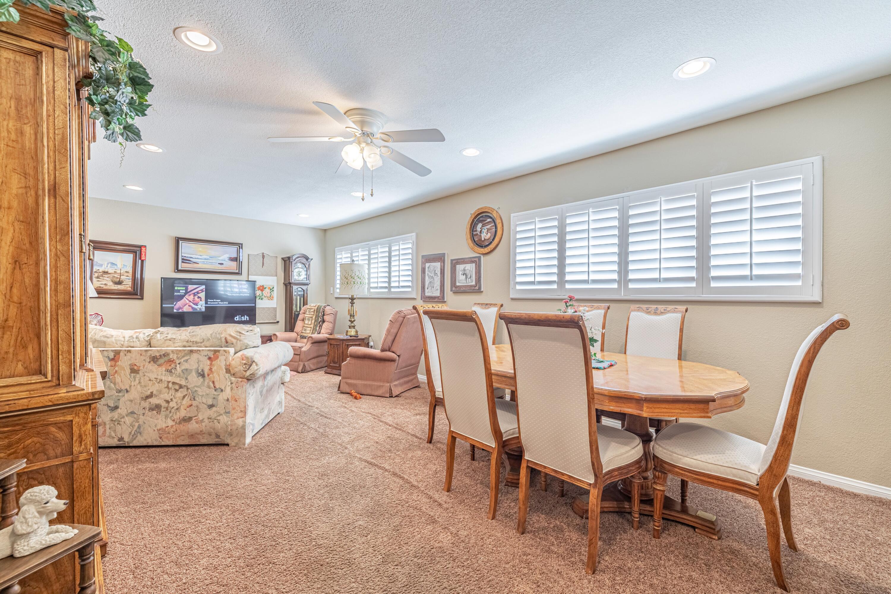 2153 West Ave K8 Lancaster, CA 93534 - Photo 14 of 31 a view of a livingroom with furniture and a large window