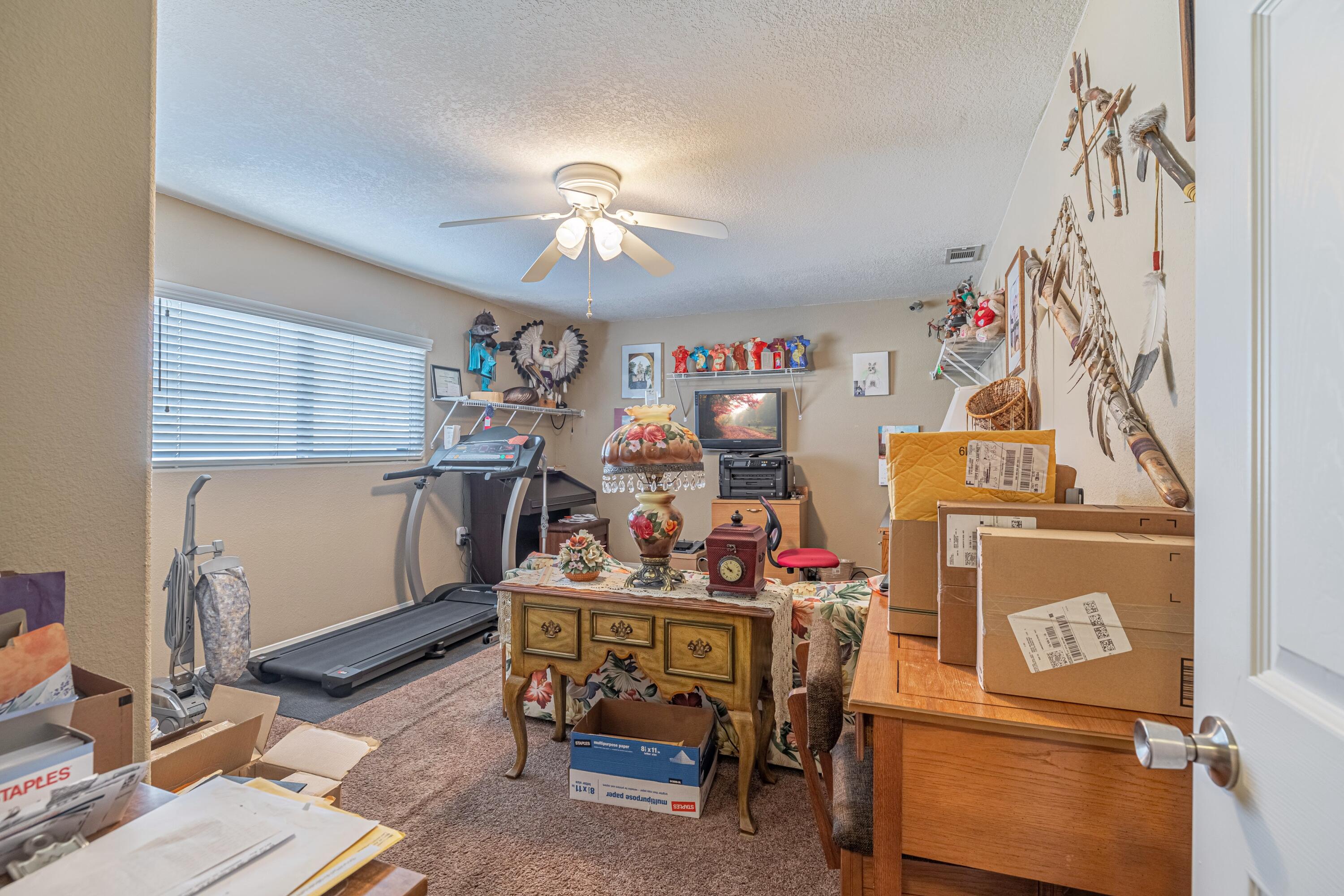 2153 West Ave K8 Lancaster, CA 93534 - Photo 24 of 31 a room with storage and utility