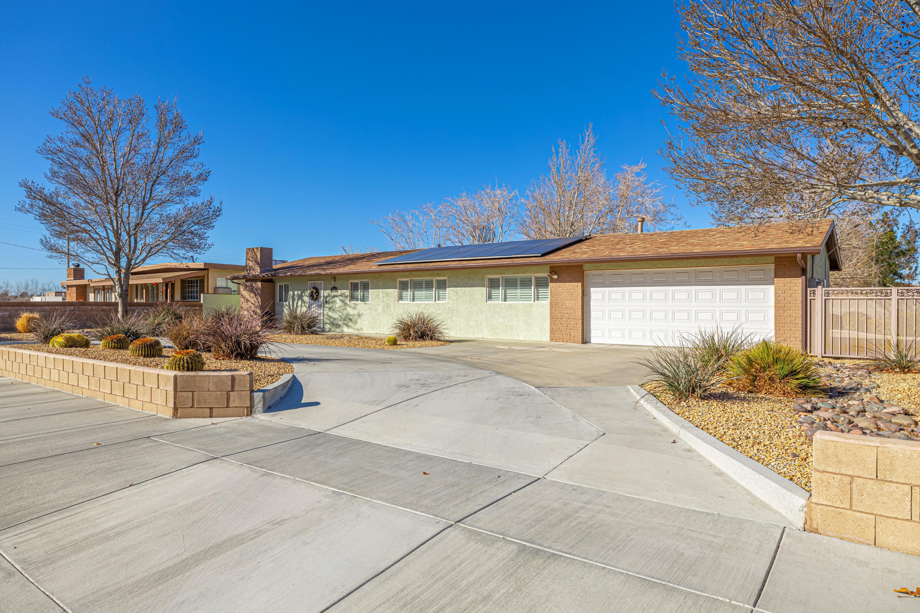 2153 West Ave K8 Lancaster, CA 93534 - Photo 3 of 31 a front view of a house with trees