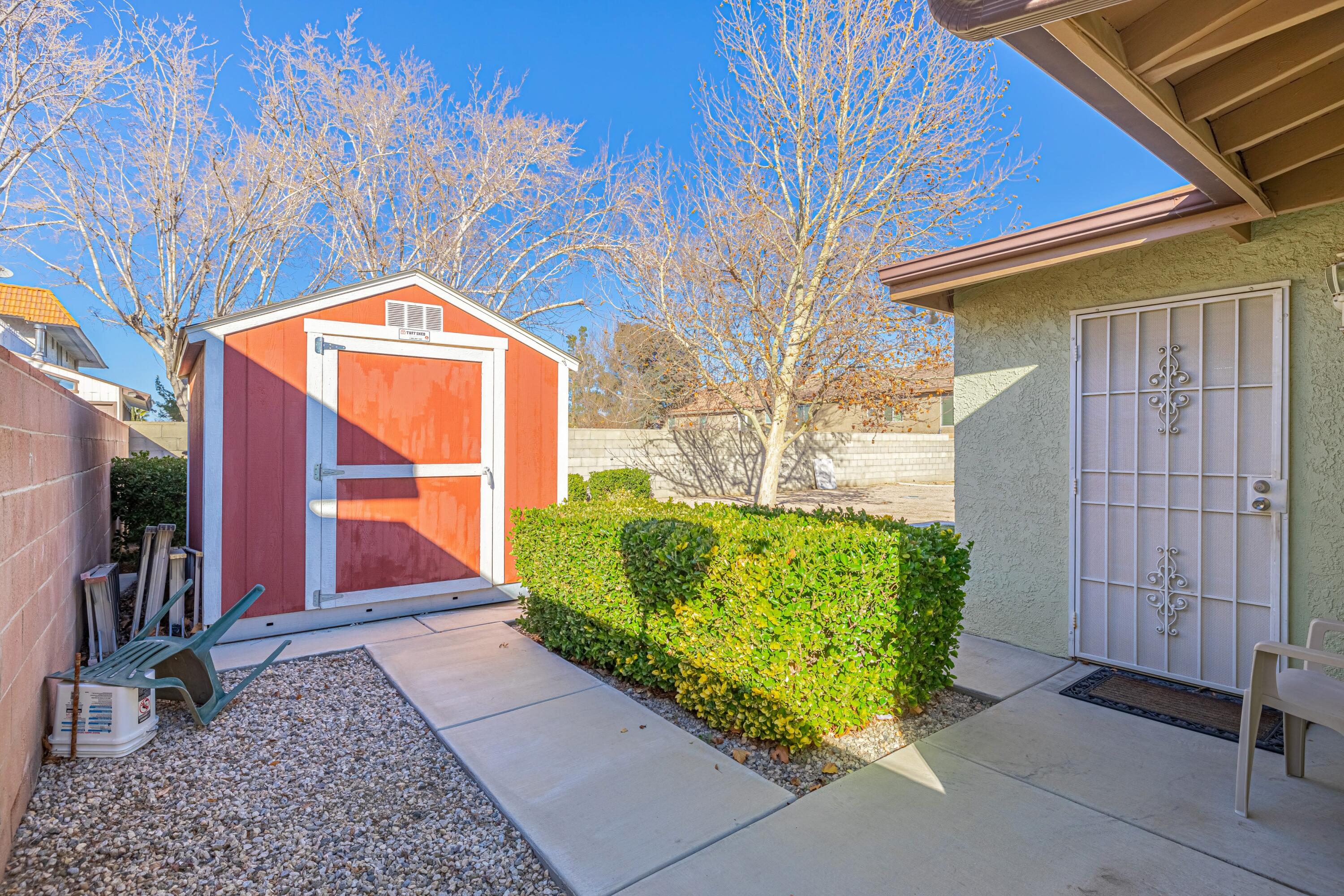2153 West Ave K8 Lancaster, CA 93534 - Photo 31 of 31 a front view of a house with garden