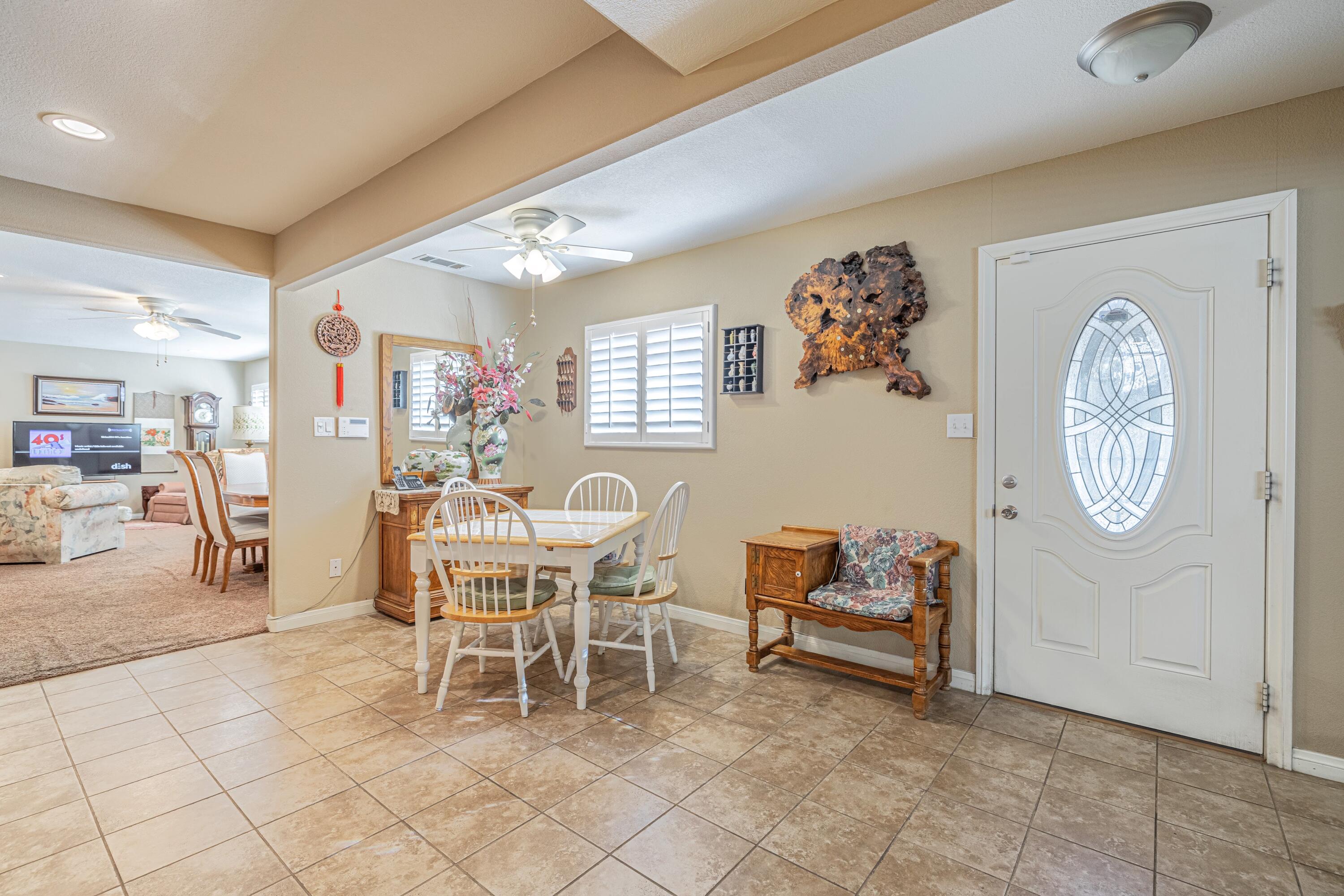 2153 West Ave K8 Lancaster, CA 93534 - Photo 5 of 31 a living room with furniture and a large window