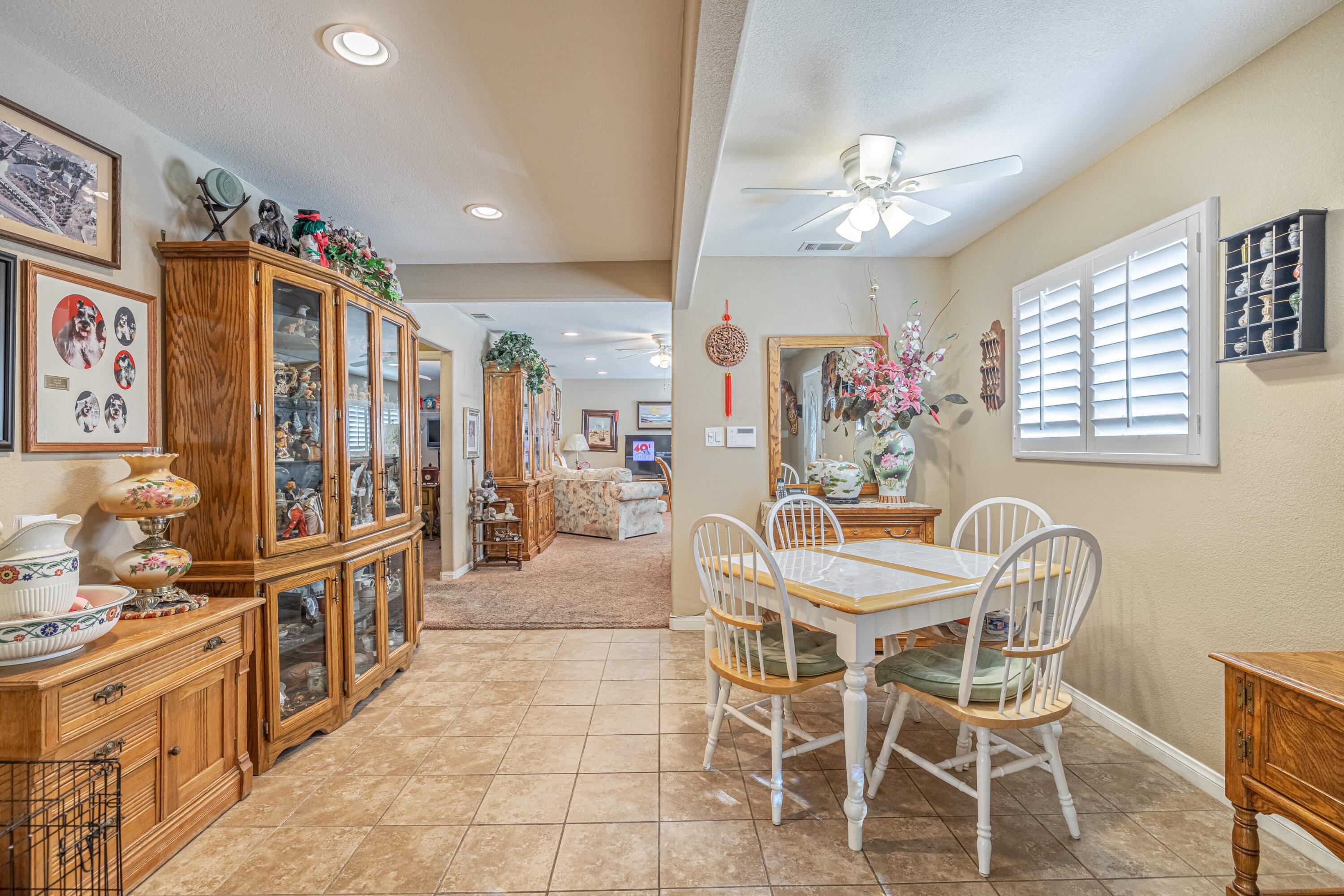 2153 West Ave K8 Lancaster, CA 93534 - Photo 7 of 31 a view of a dining room with furniture