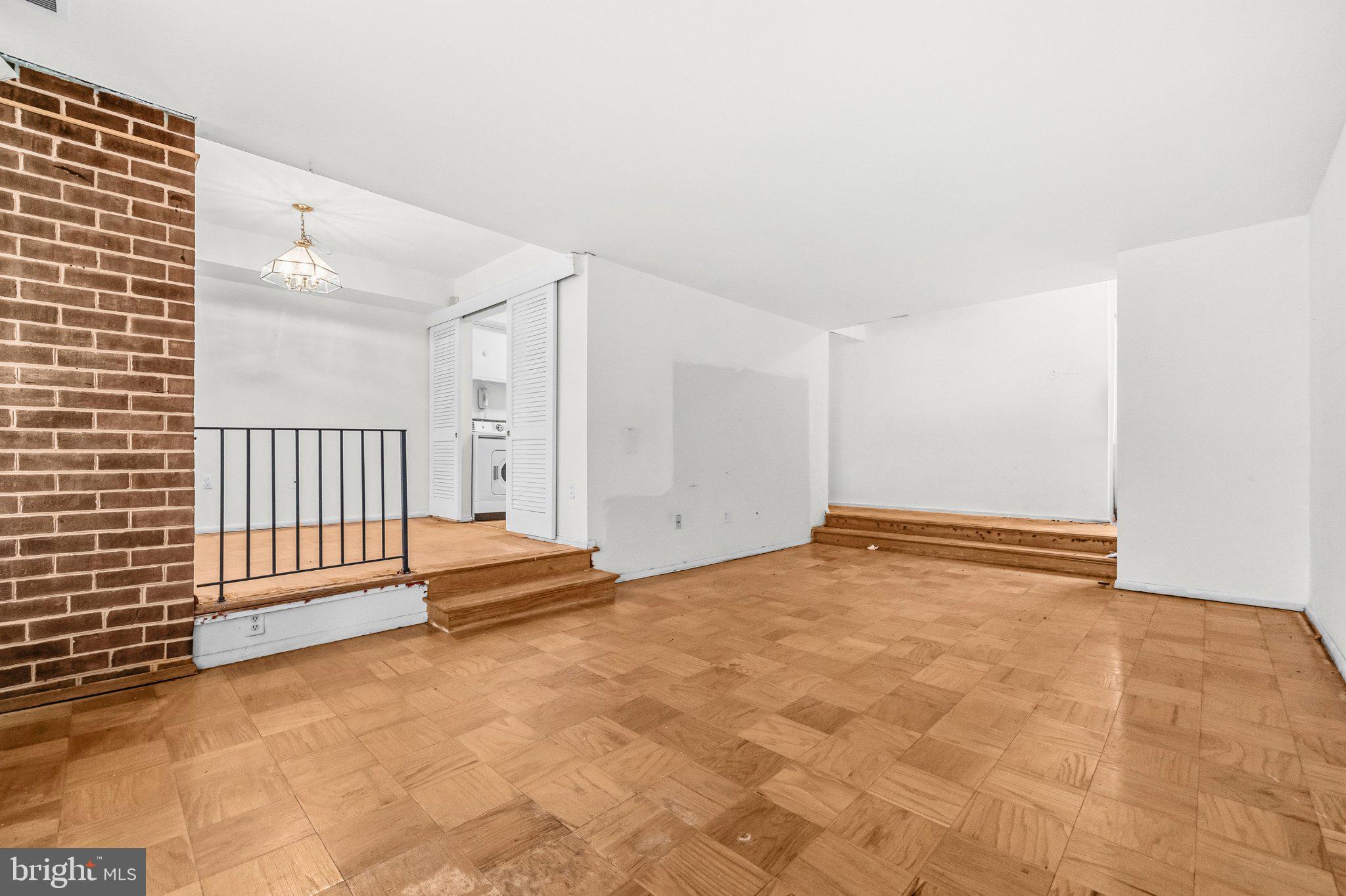 2103 Walsh View Terrace, Unit 102 Silver Spring, MD 20902 - Photo 9 of 30 Spacious, versatile living area awaits.