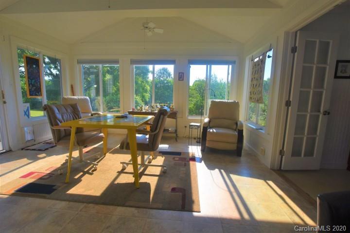 294 Church Street Rutherfordton, NC 28139 - Photo 14 of 29 a living room with furniture floor to ceiling window and floor to ceiling window