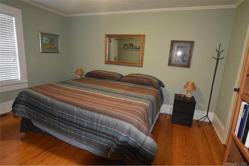 294 Church Street Rutherfordton, NC 28139 - Photo 19 of 29 a bedroom with a bed and a window