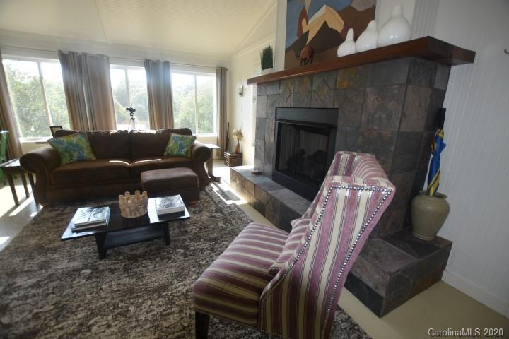 294 Church Street Rutherfordton, NC 28139 - Photo 6 of 29 a living room with furniture and a fireplace