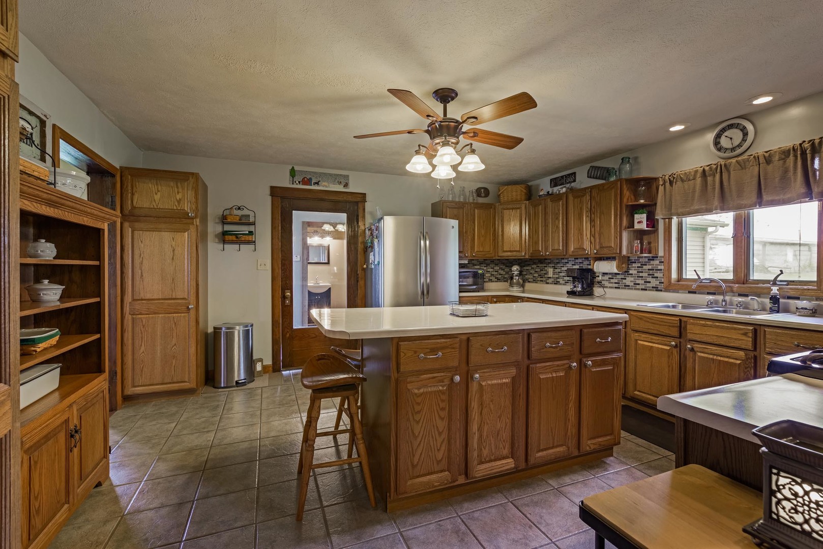 6299 Wenderoth Road Minier, IL 61759 - Photo 8 of 57 a large kitchen with a table and chairs