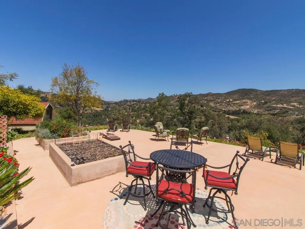 29513 Anthony Road Valley Center, CA 92082 - Photo 34 of 59 a view of a chairs and table in the terrace