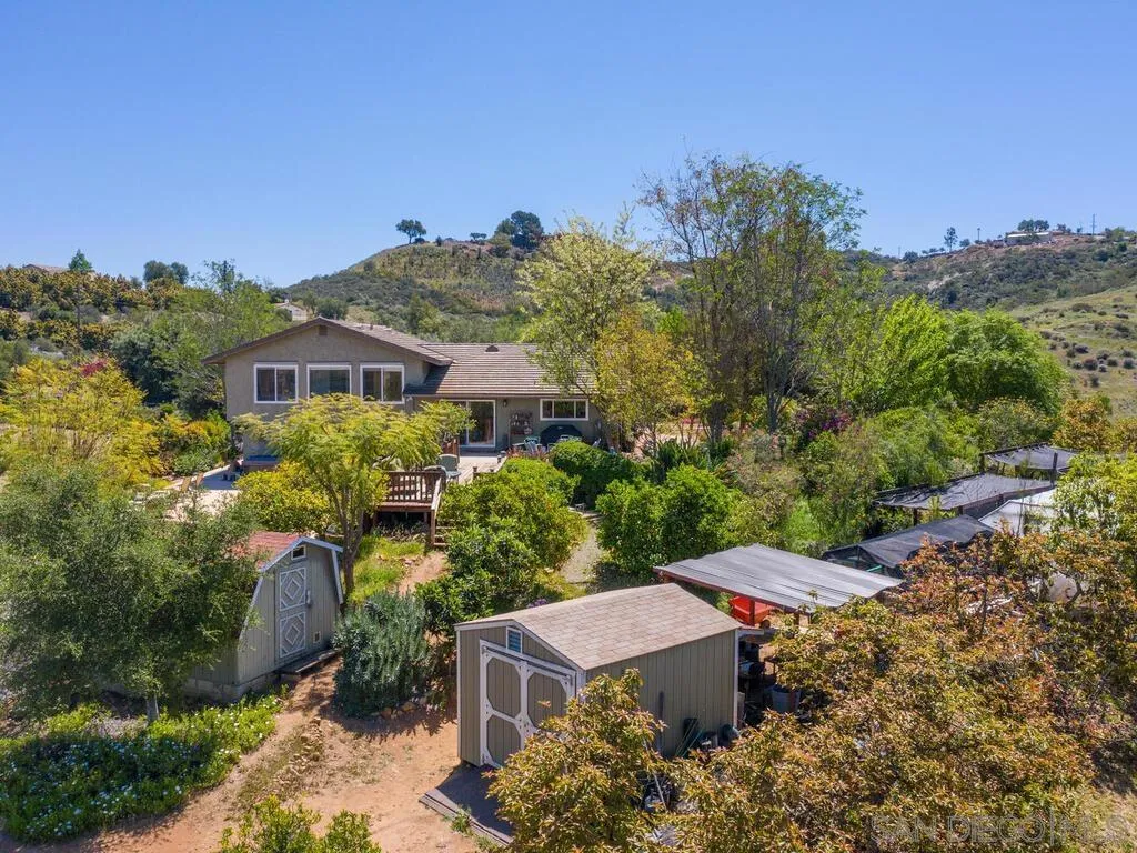 29513 Anthony Road Valley Center, CA 92082 - Photo 48 of 59 an aerial view of a house with a garden