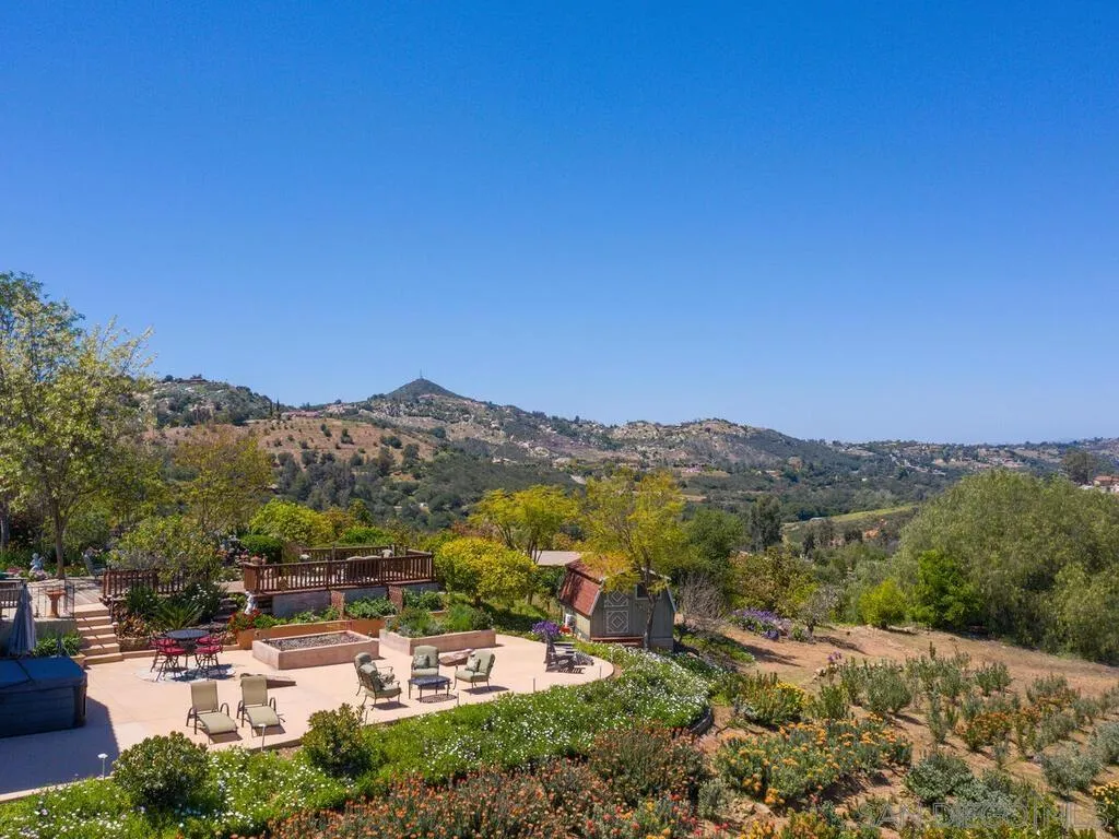 29513 Anthony Road Valley Center, CA 92082 - Photo 51 of 59 a view of a town with mountains in the background