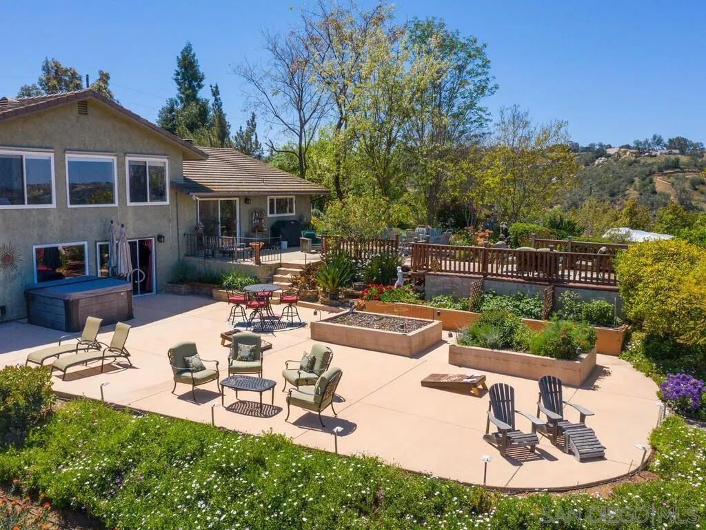 29513 Anthony Road Valley Center, CA 92082 - Photo 53 of 59 a view of a patio with couches chairs and a table and chairs