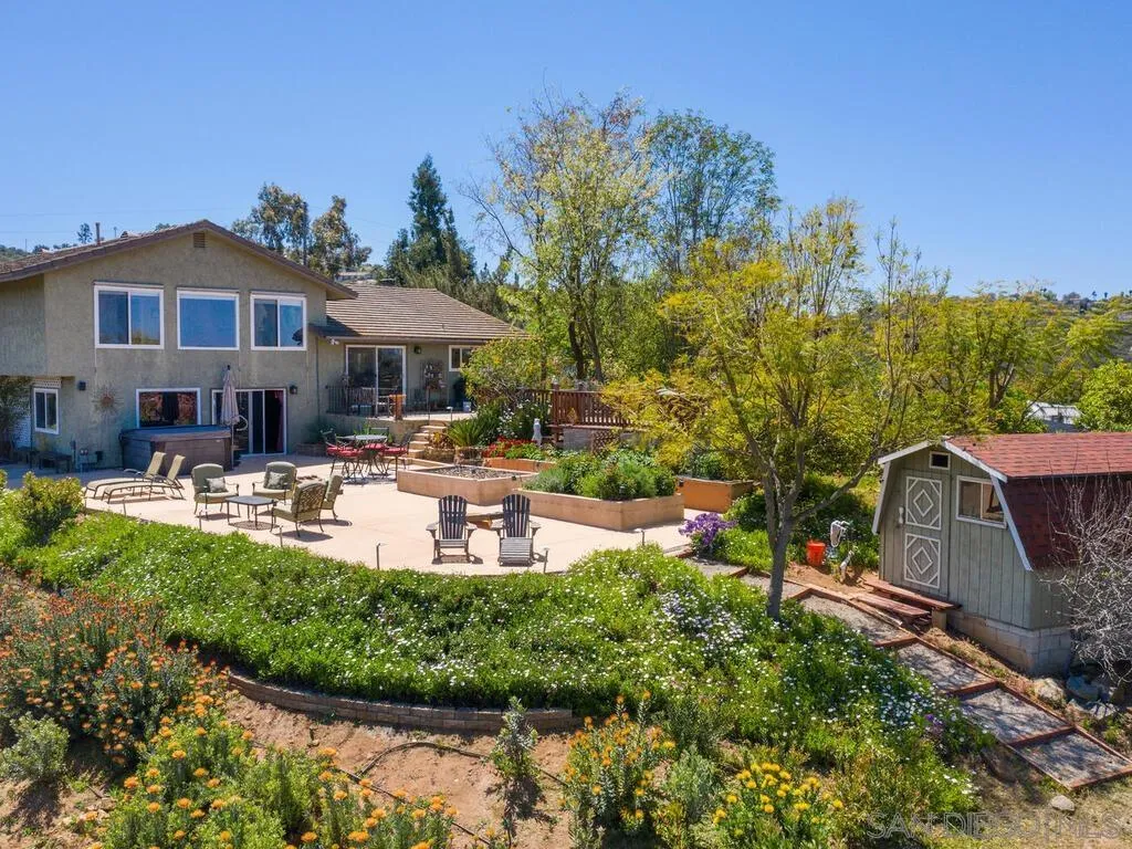 29513 Anthony Road Valley Center, CA 92082 - Photo 54 of 59 a view of a house with swimming pool and sitting area