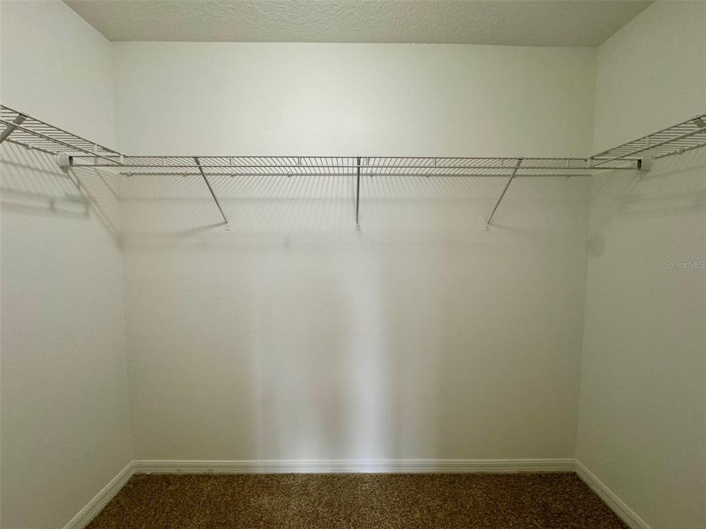 6320 Windsor Lake Circle Sanford, FL 32773 - Photo 12 of 18 a view of a room with racks on the wall
