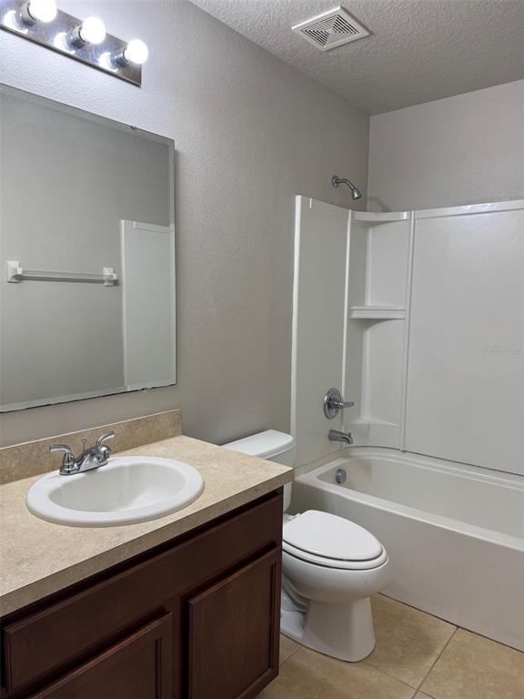 6320 Windsor Lake Circle Sanford, FL 32773 - Photo 16 of 18 a bathroom with a sink a toilet and shower