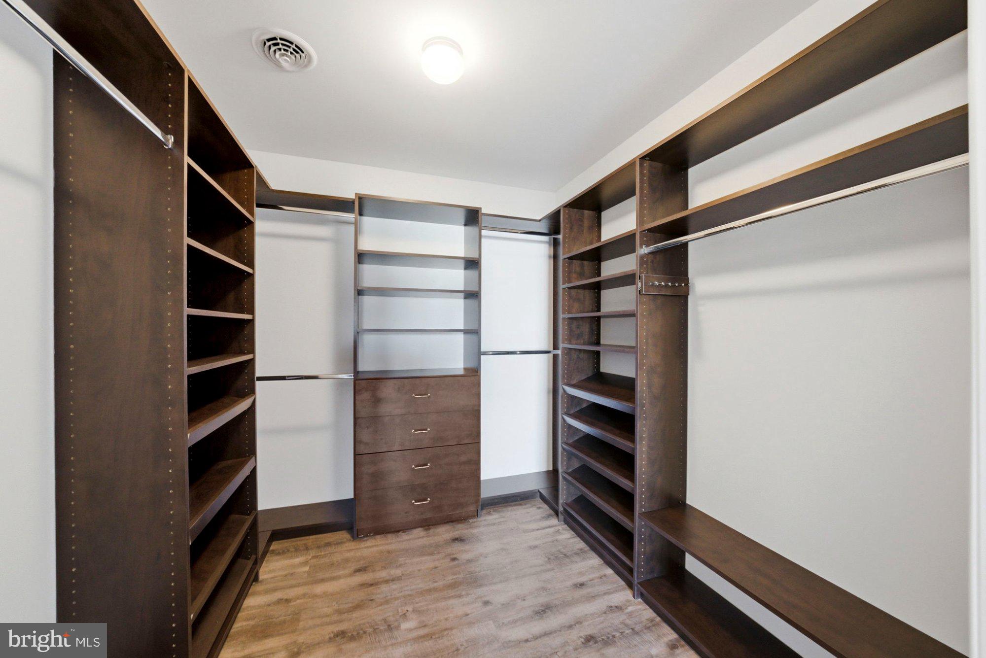 244 Manor Boulevard Hamilton, NJ 08620 - Photo 15 of 42 a view of walk in closet with empty racks