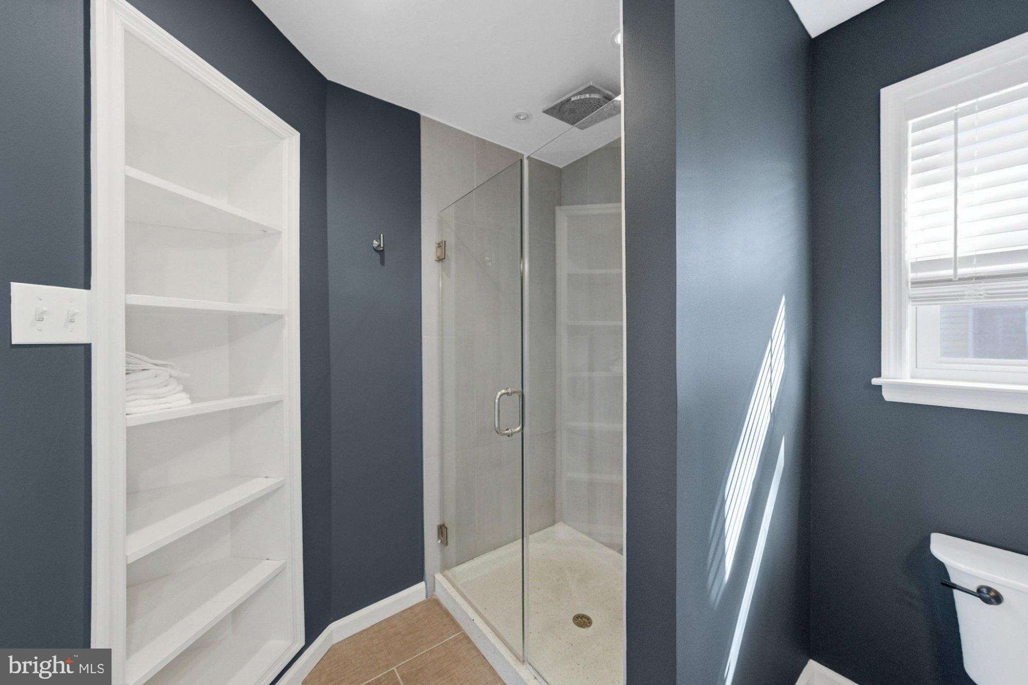 244 Manor Boulevard Hamilton, NJ 08620 - Photo 18 of 42 a bathroom with a shower and toilet