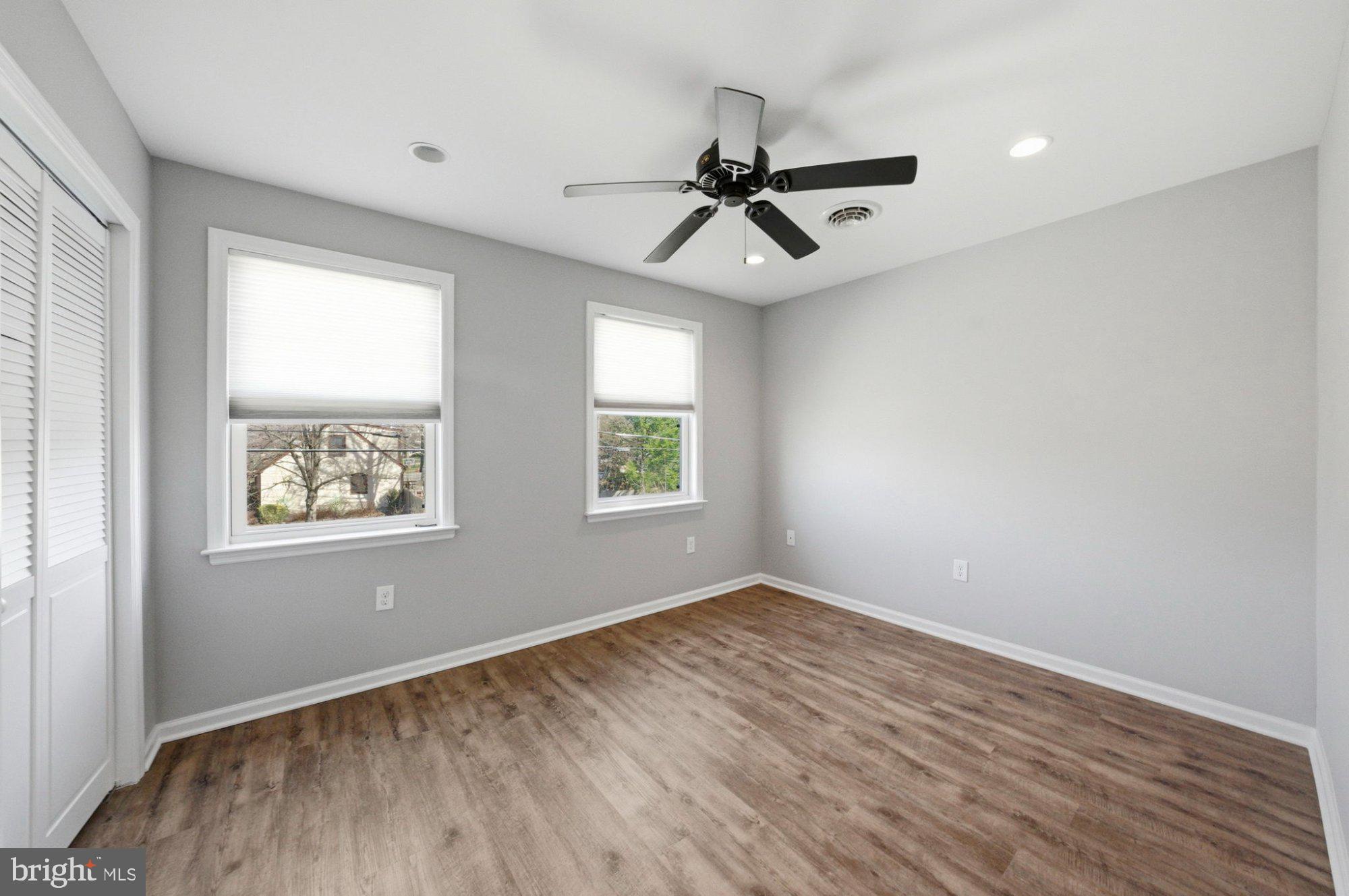 244 Manor Boulevard Hamilton, NJ 08620 - Photo 19 of 42 wooden floor in an empty room with a window