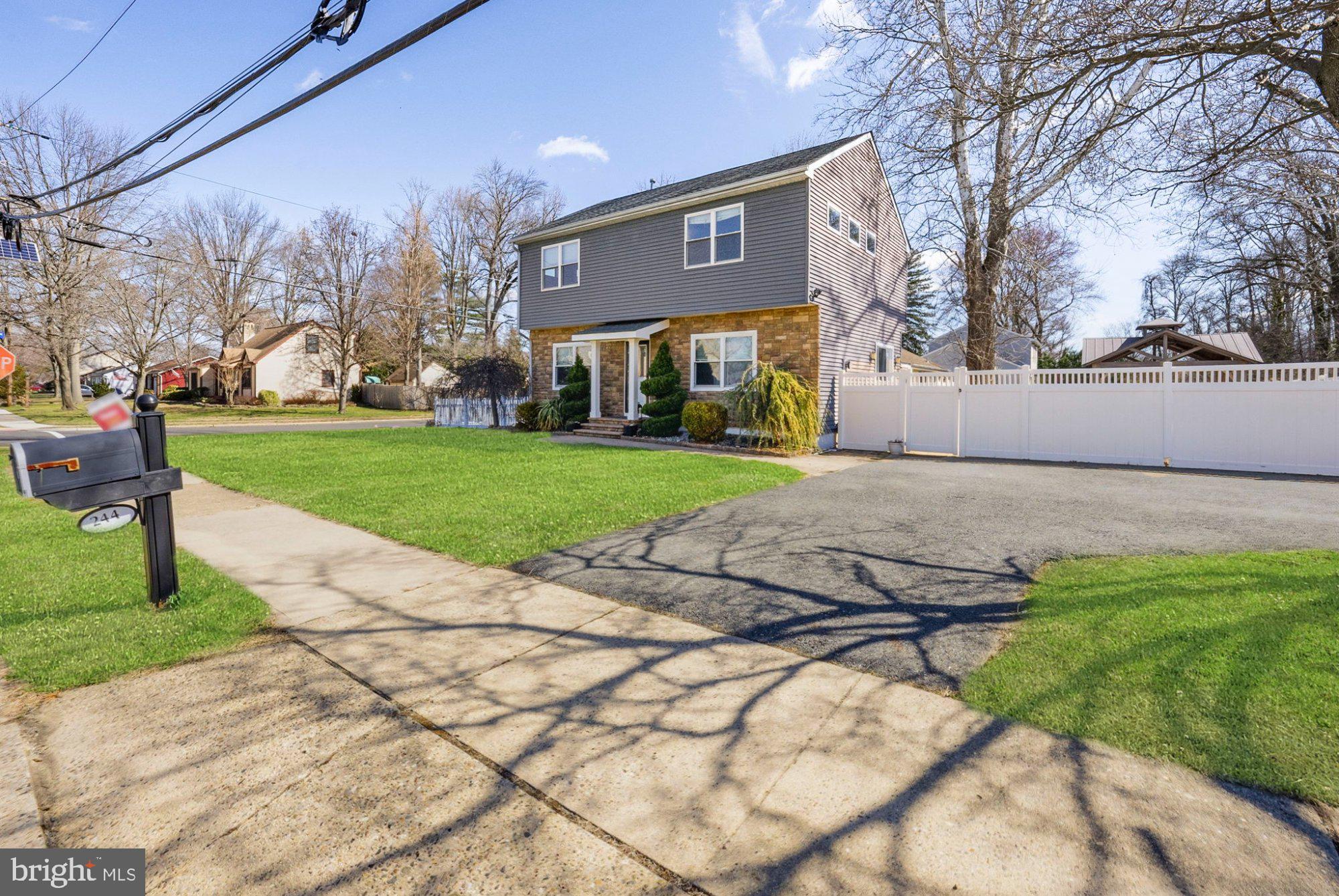 244 Manor Boulevard Hamilton, NJ 08620 - Photo 2 of 42 a view of a house with a yard