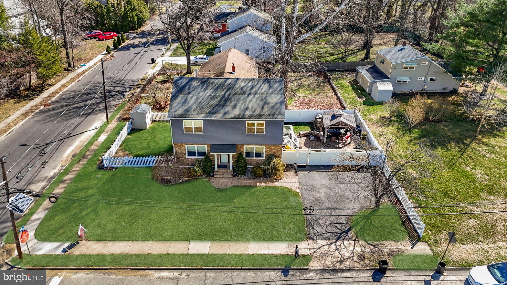 244 Manor Boulevard Hamilton, NJ 08620 - Photo 3 of 42 an aerial view of a house with garden space and street view