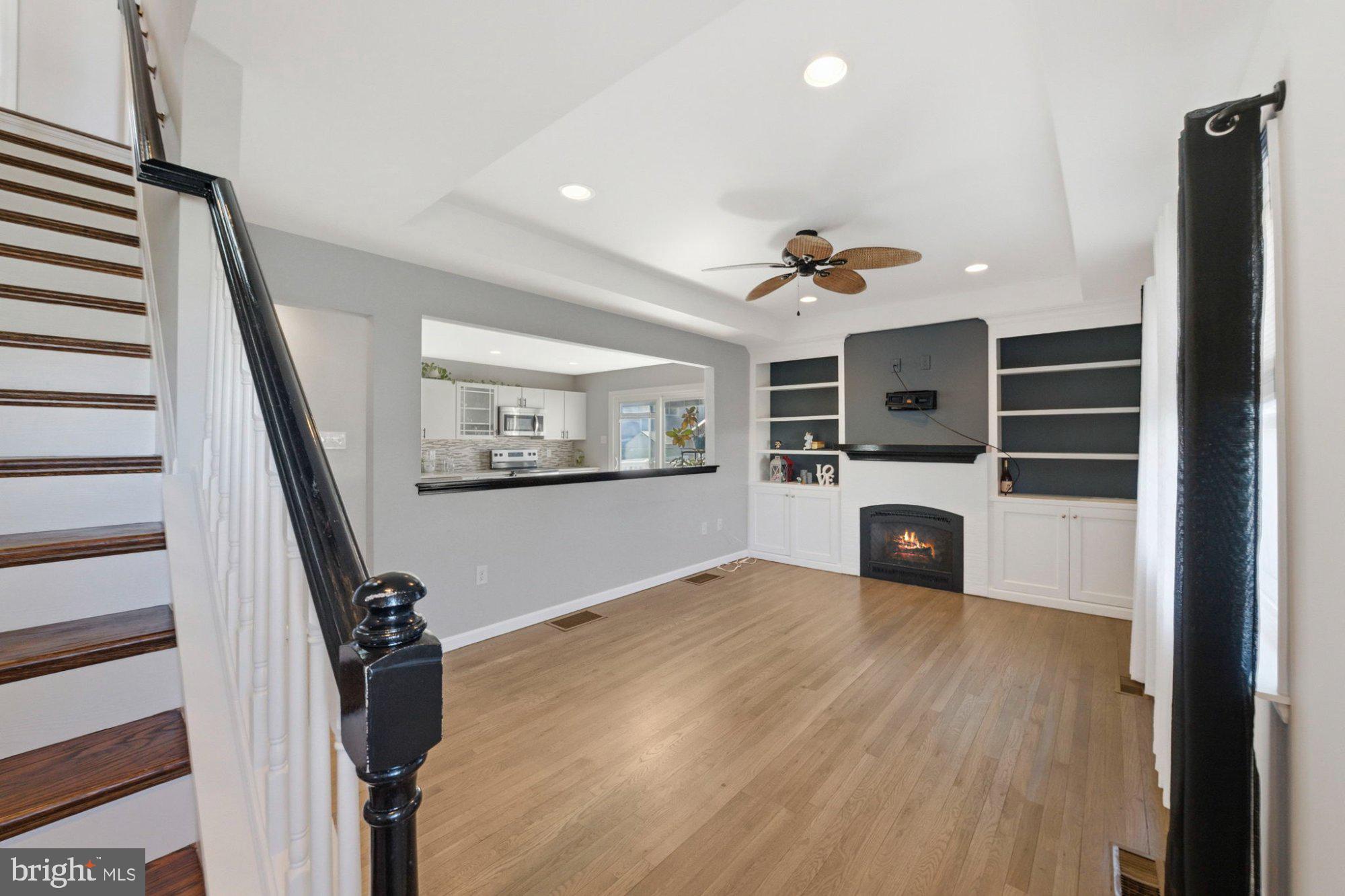 244 Manor Boulevard Hamilton, NJ 08620 - Photo 9 of 42 a living room with furniture and a flat screen tv