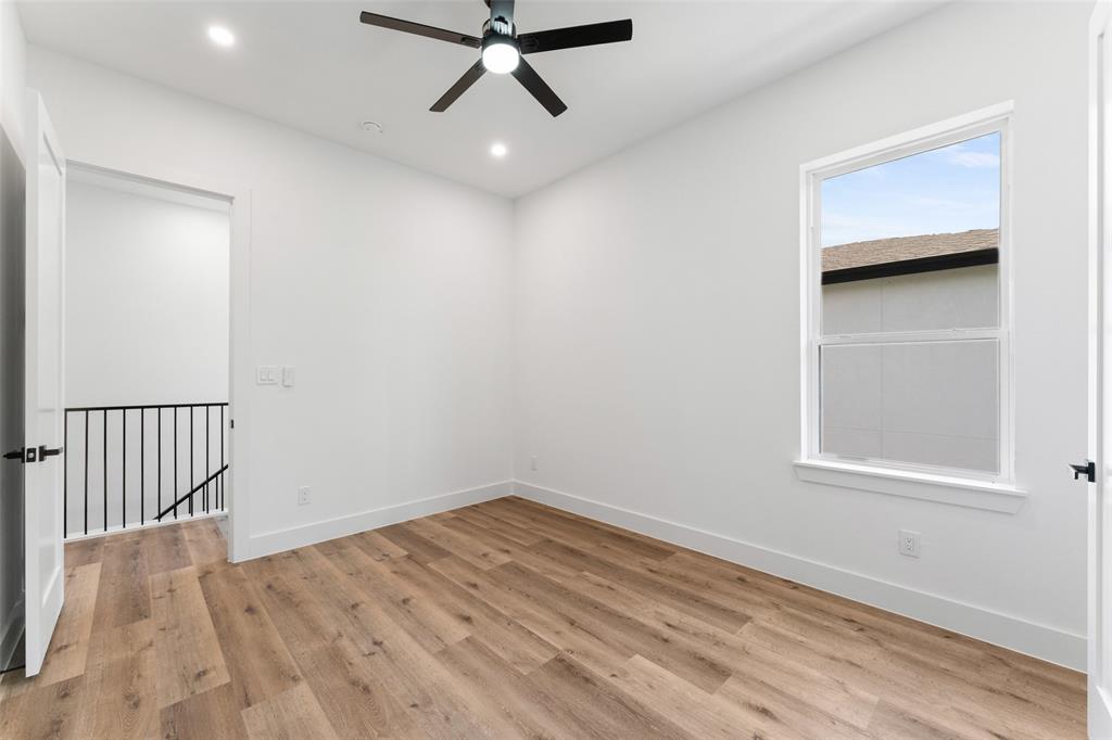 2828 Rochester Street Dallas, TX 75215 - Photo 20 of 36 Empty room featuring light wood finished floors, recessed lighting, and ceiling fan