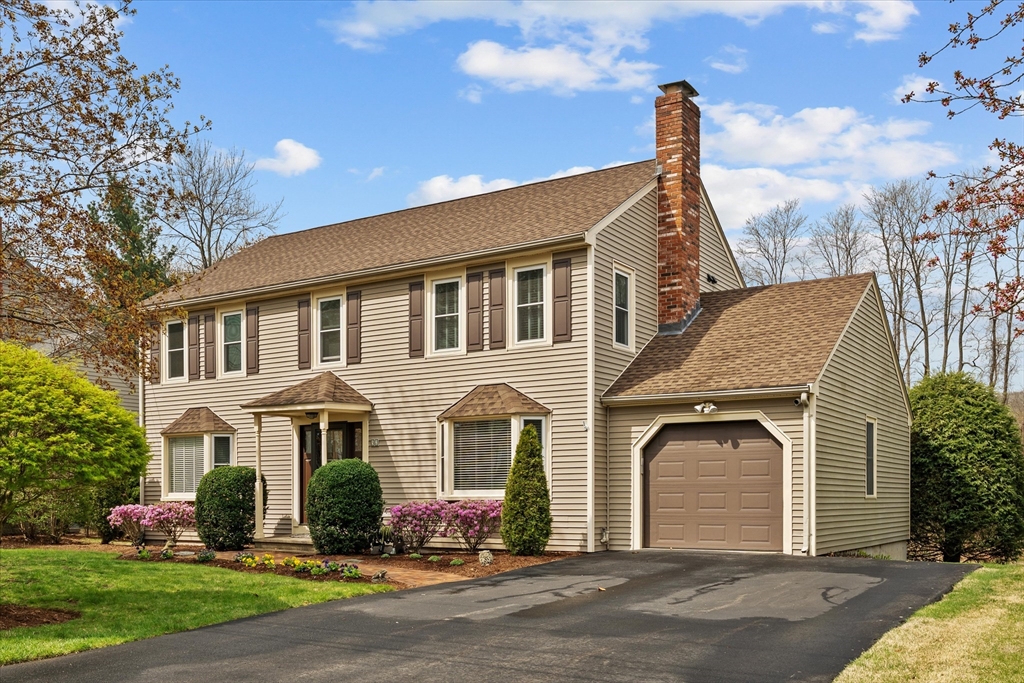 52 Pitt Road Framingham, MA 01701 - Photo 1 of 41 a front view of a house with garden