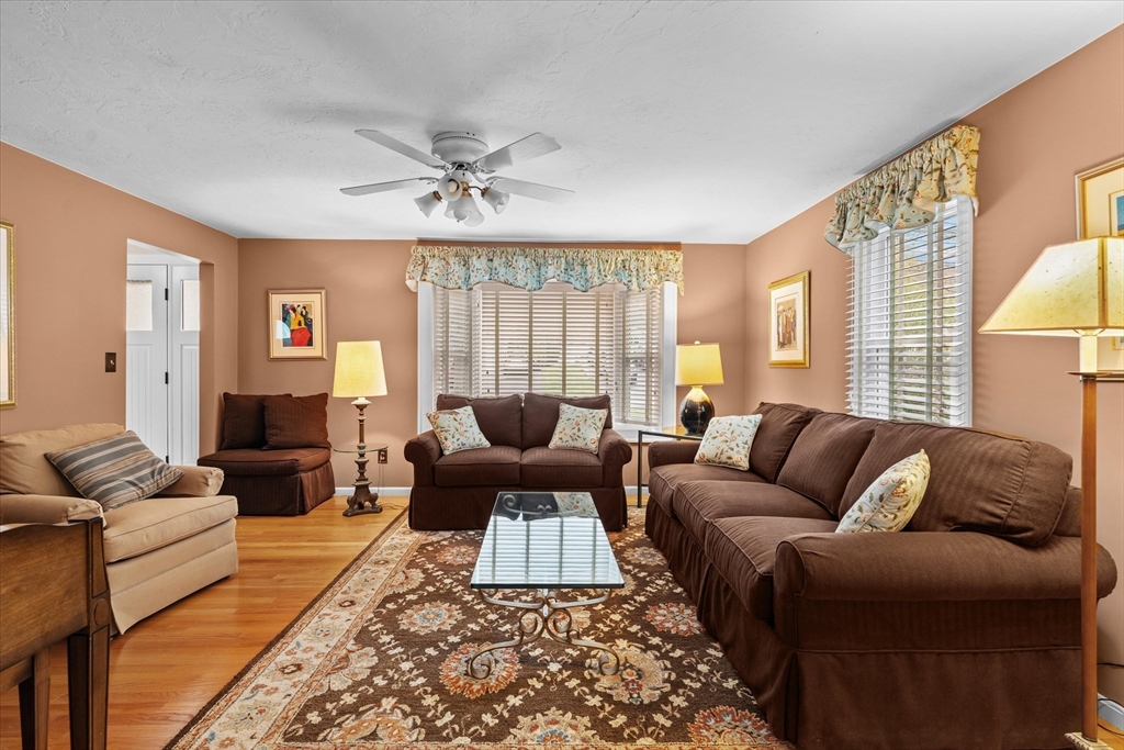 52 Pitt Road Framingham, MA 01701 - Photo 21 of 41 a living room with furniture and a fireplace