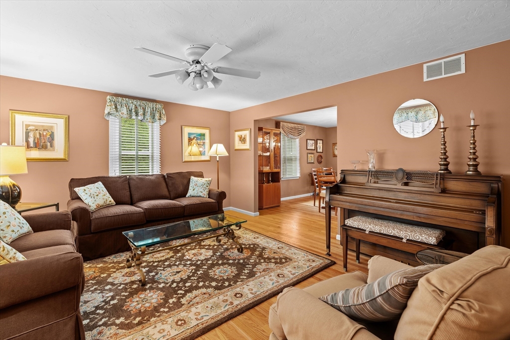52 Pitt Road Framingham, MA 01701 - Photo 22 of 41 a living room with furniture a rug and a large window