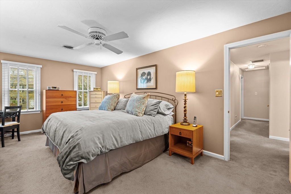 52 Pitt Road Framingham, MA 01701 - Photo 29 of 41 a spacious bedroom with a bed and dresser