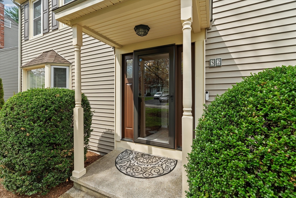 52 Pitt Road Framingham, MA 01701 - Photo 3 of 41 a front view of a house with garden