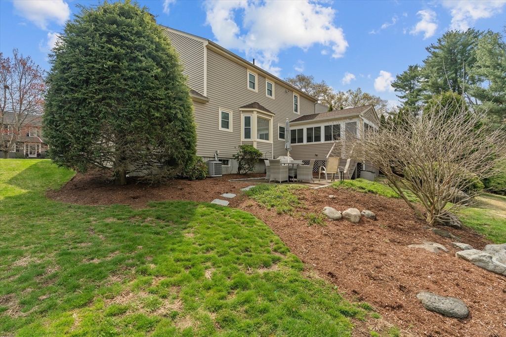52 Pitt Road Framingham, MA 01701 - Photo 37 of 41 a front view of a house with a yard and trees