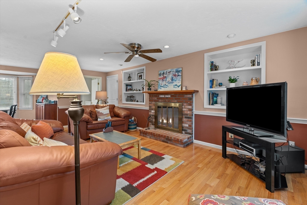 52 Pitt Road Framingham, MA 01701 - Photo 6 of 41 a living room with furniture and a flat screen tv