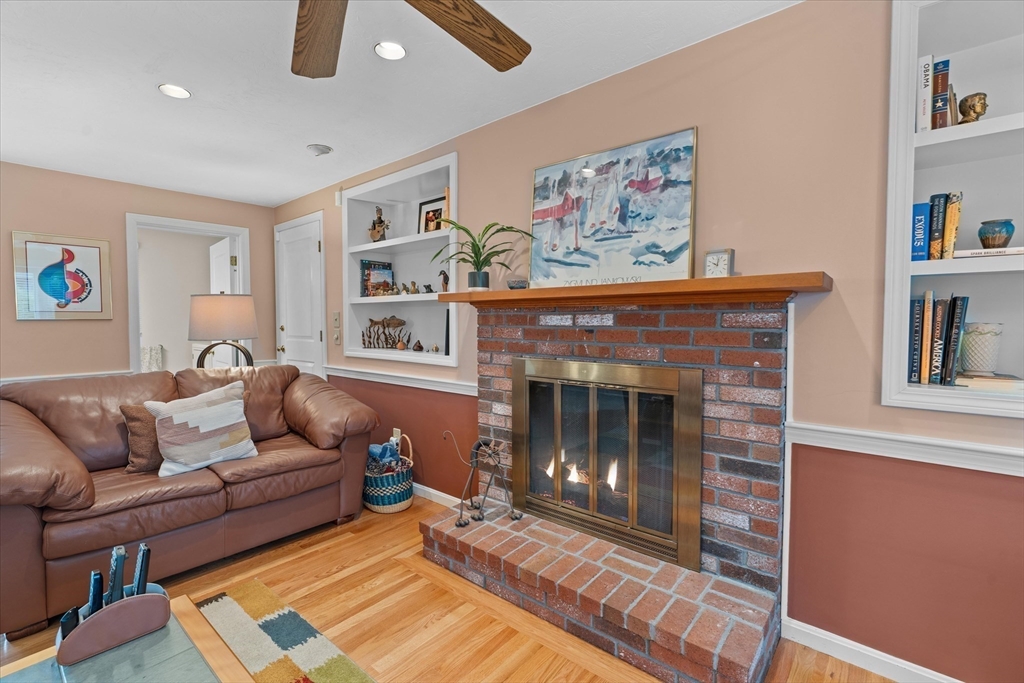 52 Pitt Road Framingham, MA 01701 - Photo 7 of 41 a living room with furniture and a fireplace