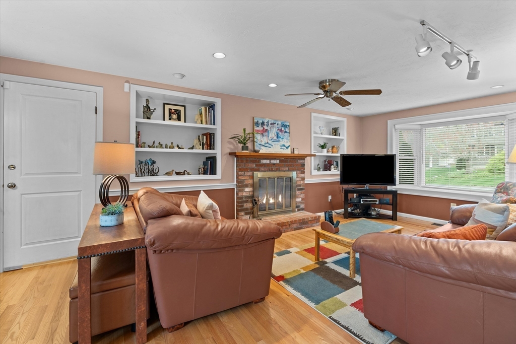 52 Pitt Road Framingham, MA 01701 - Photo 9 of 41 a living room with furniture and a flat screen tv