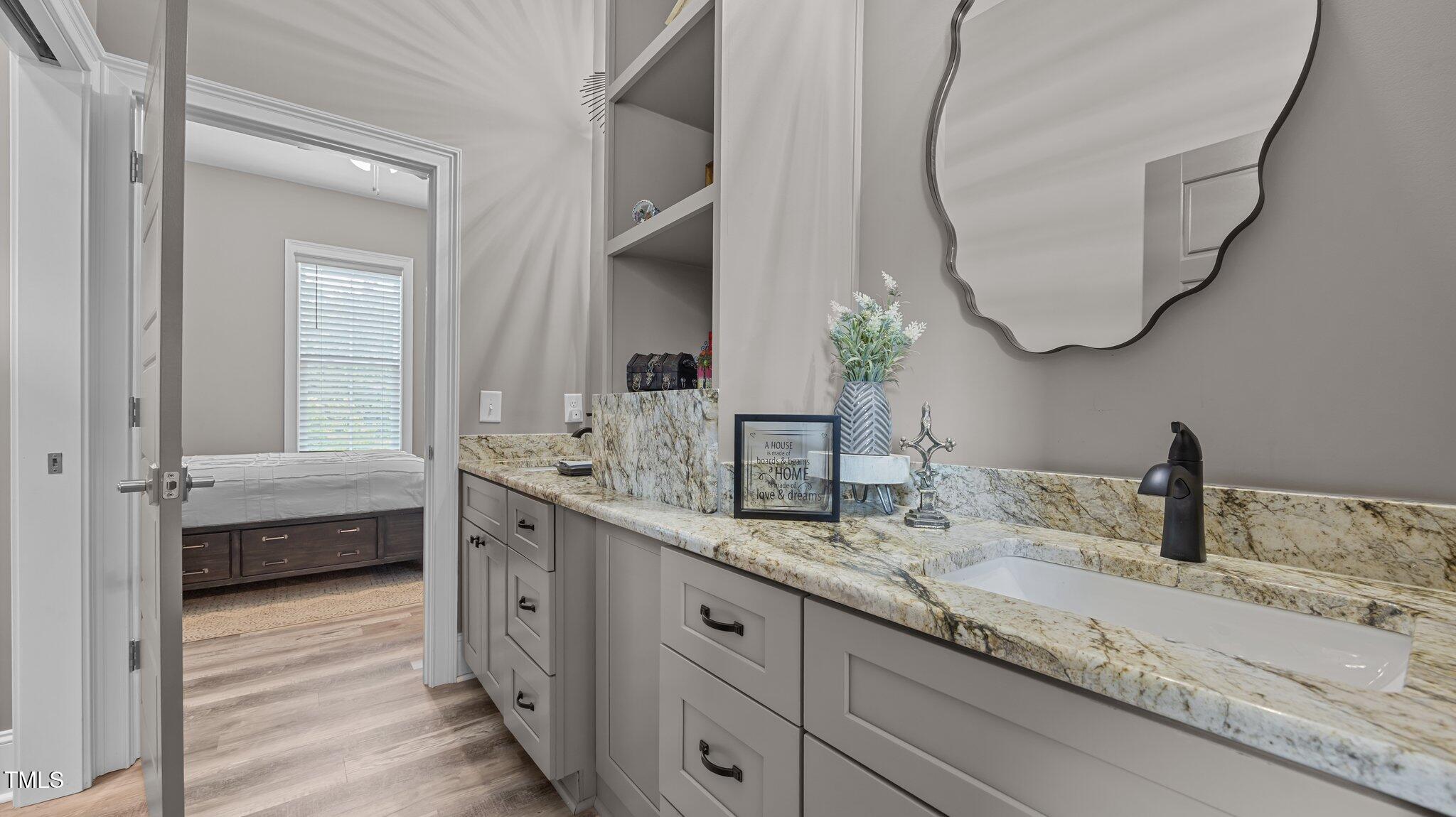 4152 Boyd Wright Road Burlington, NC 27215 - Photo 32 of 65 Dual sinks. Granite countertops