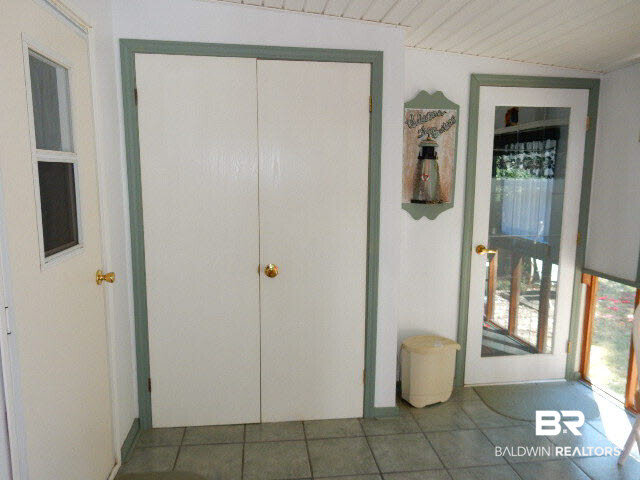 417 Maria Drive Lillian, AL 36549 - Photo 21 of 32 Storage Closet in Sunroom