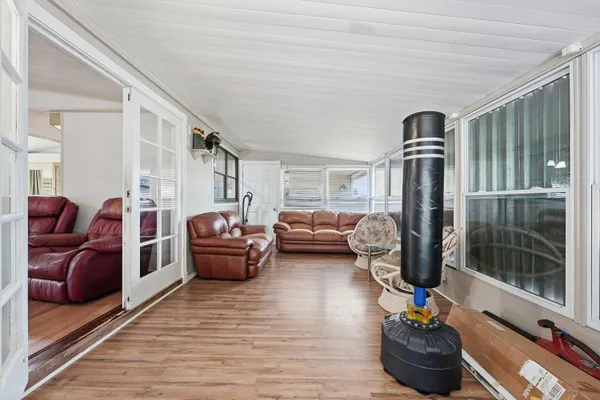 a living room with furniture or couch and a table