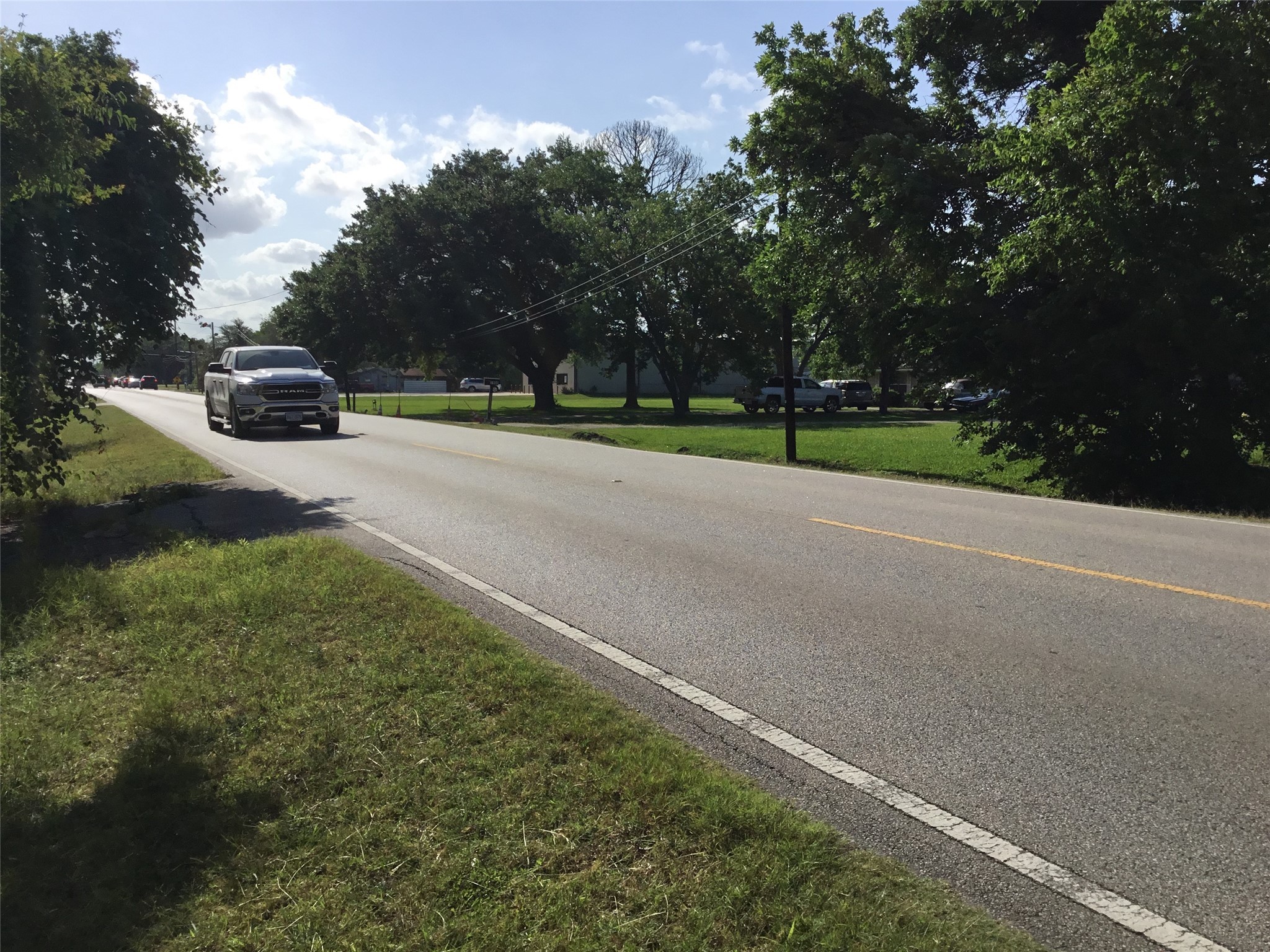 a view of outdoor space with playground and green space