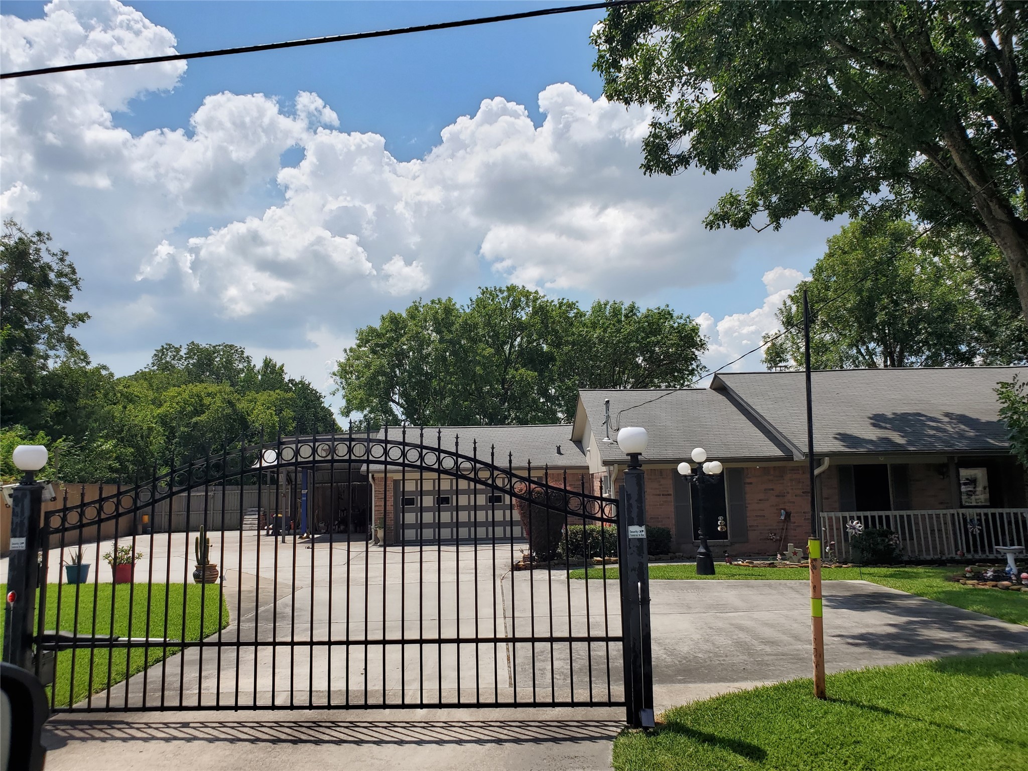 1817 West Cedar Bayou Lynchburg Road Baytown, TX 77521 - Photo 13 of 13 a view of a house with wooden fence