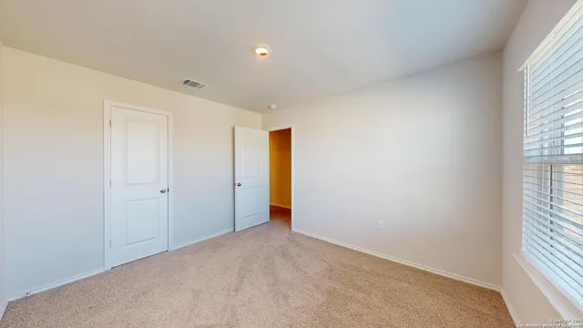a bathroom with a granite countertop toilet a sink and bathtub